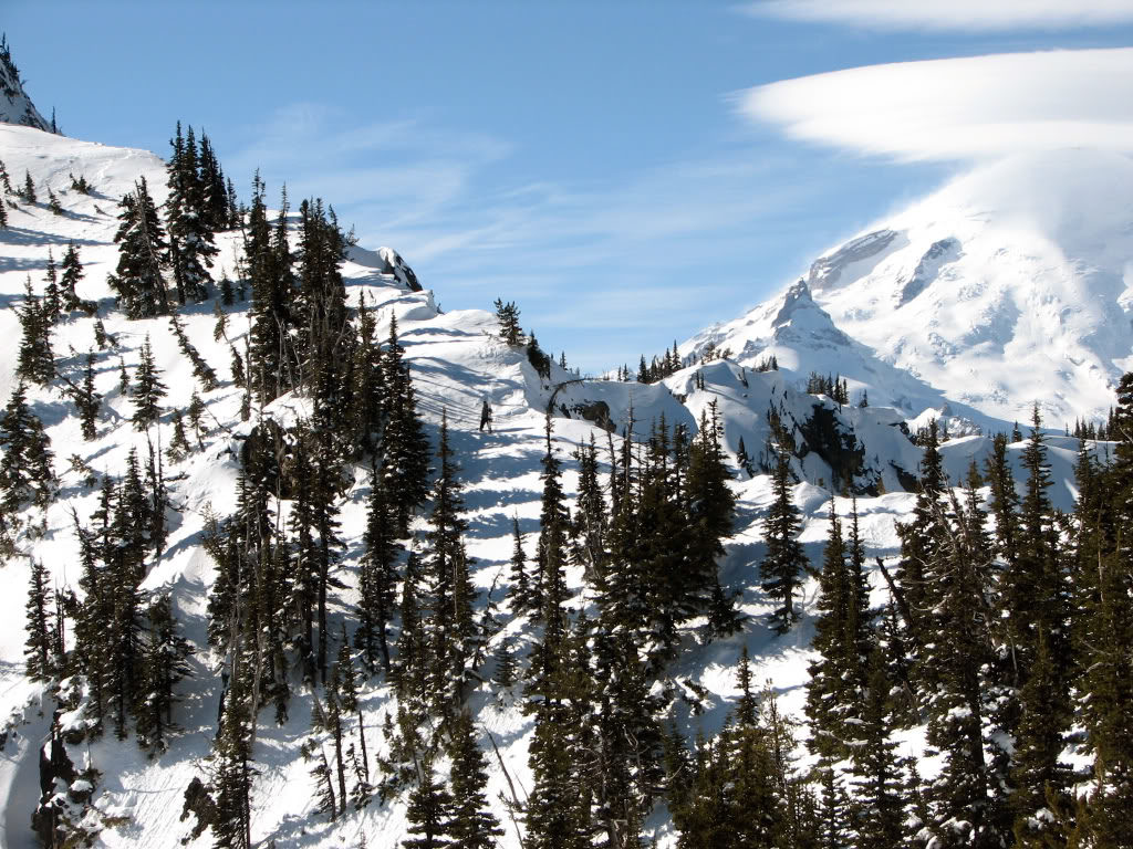 Traversing across the ridge of Sheep Lake Basin with Rainier in the background